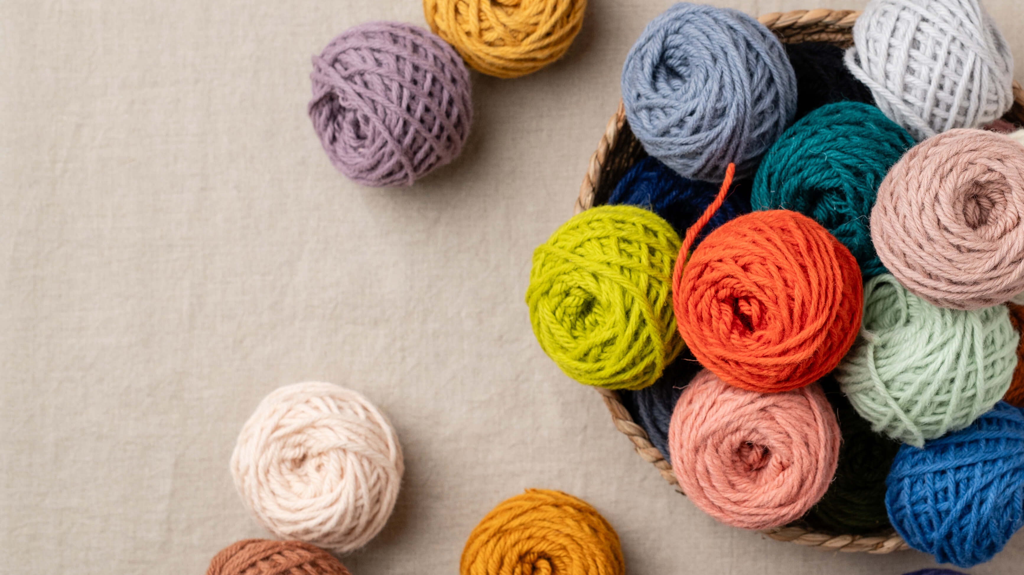 100% wool chunky punch needle rug yarn in a tumbling pile