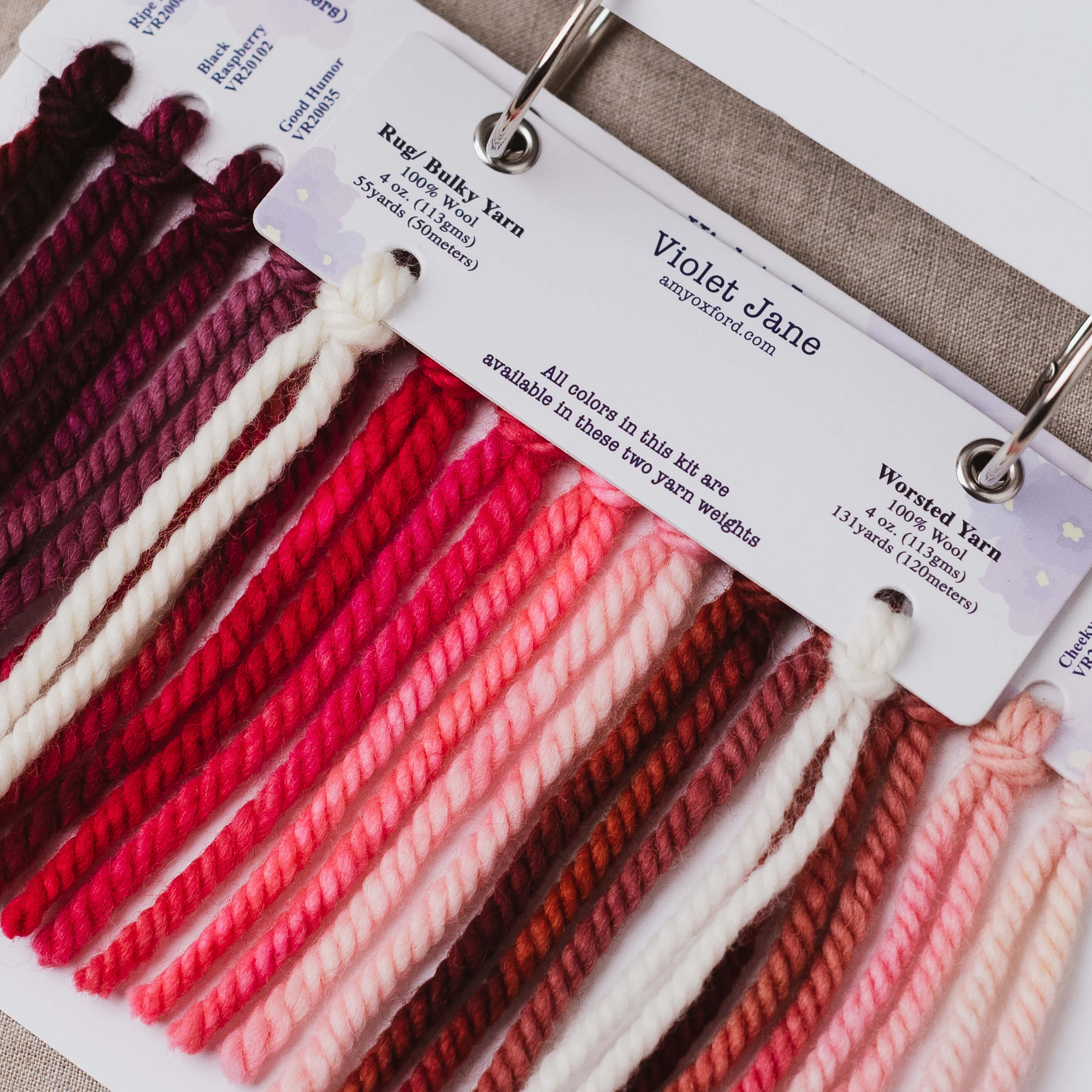 Color swatches of yarn with 'Violet Jane' branding on a white background
