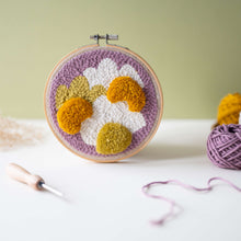 Load image into Gallery viewer, Daisy punch needle and tufted hoop in lilac, mustard, white and chartreuse with punch needle and yarn coming into focus
