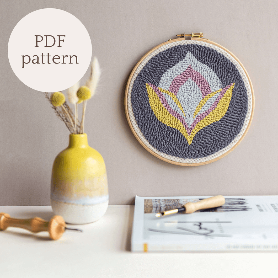 Summer floral punch needle hoop on a wall styled with dry flowers, text to indicate it is a PDF pattern