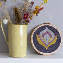 Load image into Gallery viewer, Summer floral punch needle hoop styled with a yellow speckled jug filled with yellow and pink dried flowers