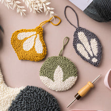 Load image into Gallery viewer, Classic punch needle bauble decorations lying flat on a table top