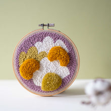Load image into Gallery viewer, Daisy punch needle and tufted hoop in lilac, white, mustard and chartreuse, with dried natural cotton blurred in the foreground