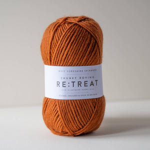 Ball of burnt orange tranquil west yorkshire spinners re:treat yarn